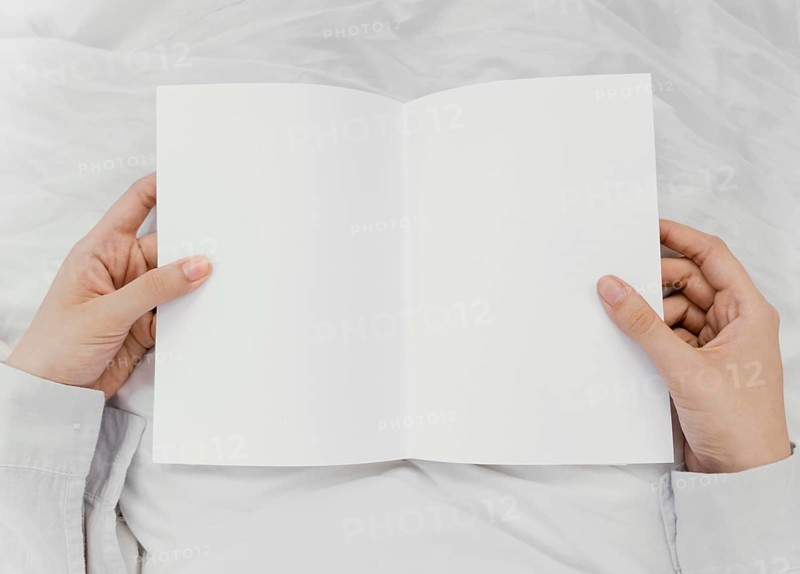 Woman reading book alone
