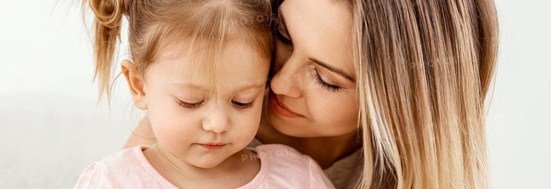 Beautiful daughter mother spending time together home