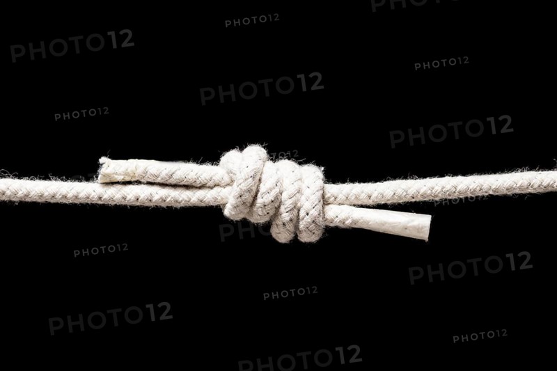 Twine strong white rope isolated black background