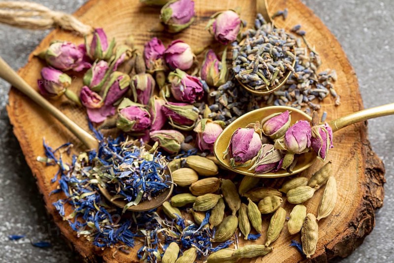 Top view assortment spices wooden board
