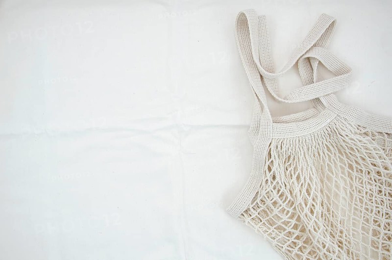 Top view cotton net bag white background