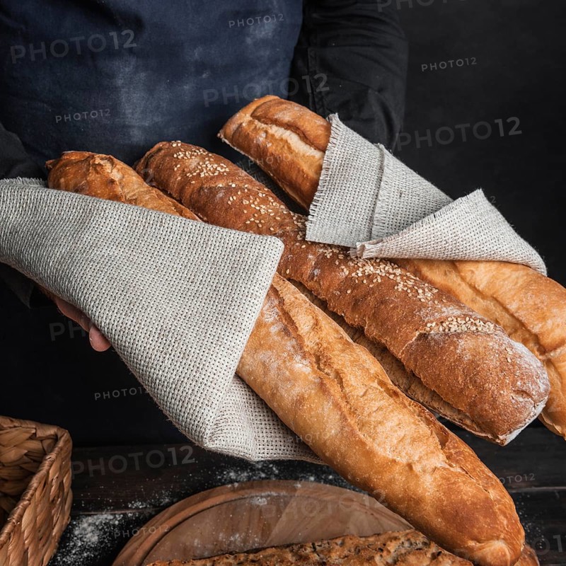 Crusty loaves bread wrapped burlap fabric