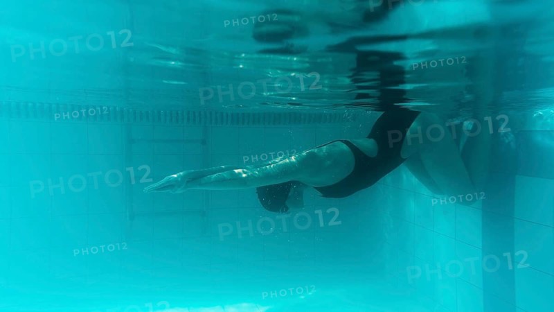 Swimmer underwater preparing race