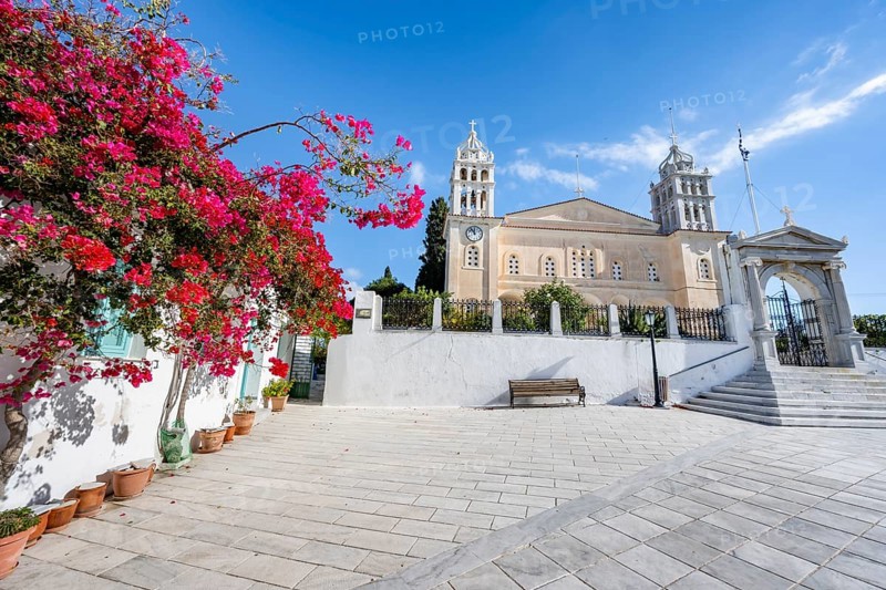 Church of Agia Triada with red bougainvillea