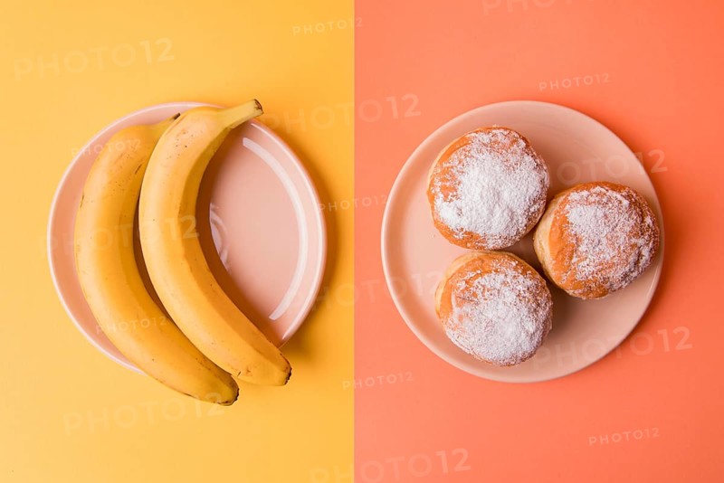 Top view bananas donuts