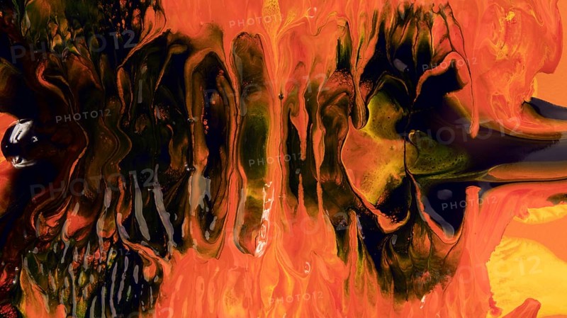 Black paint mixing with orange