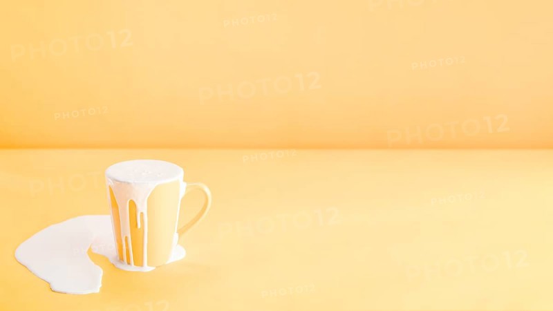 Filling too much milk into mug