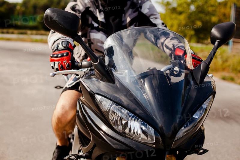 Front view motorbike with biker