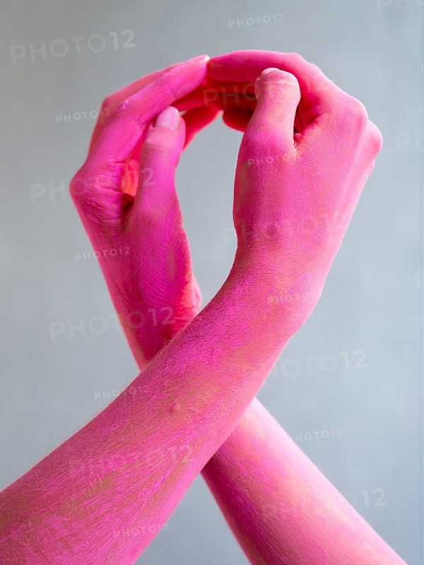 Close up painted arms expressing cancer awareness