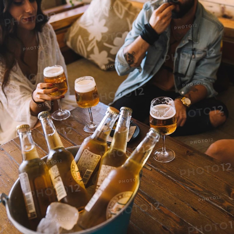 Friends with beers bucket