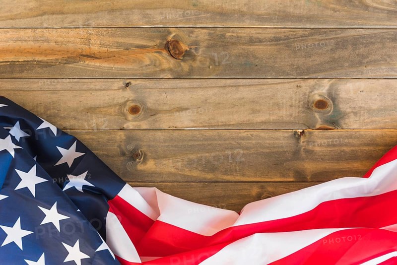 Fabric us flag wooden surface