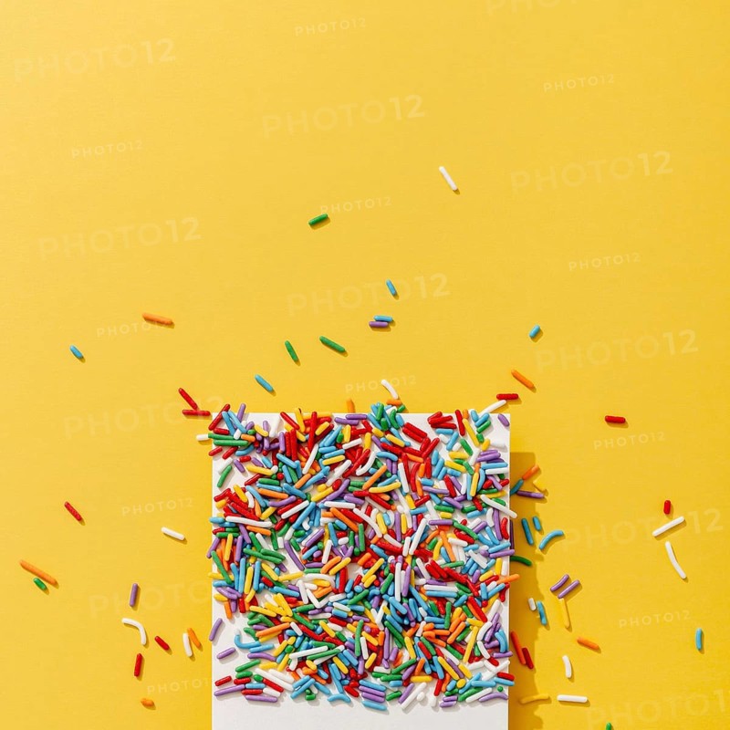 Top view colorful sprinkles with copy space