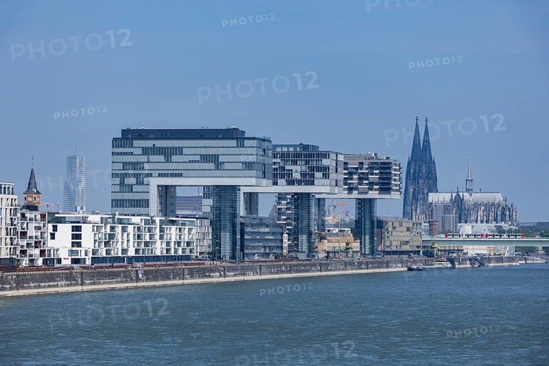 City view of the Rheinauhafen in Cologne with the 3 crane houses