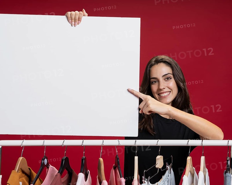 Beautiful woman holding banner mock up