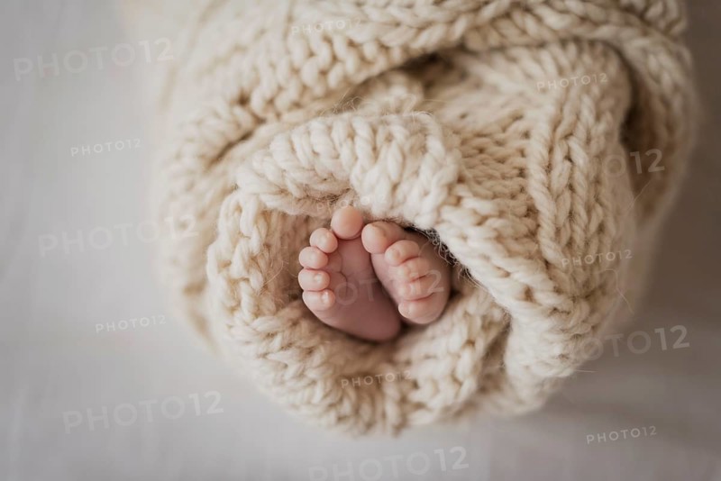 Close up legs new born child