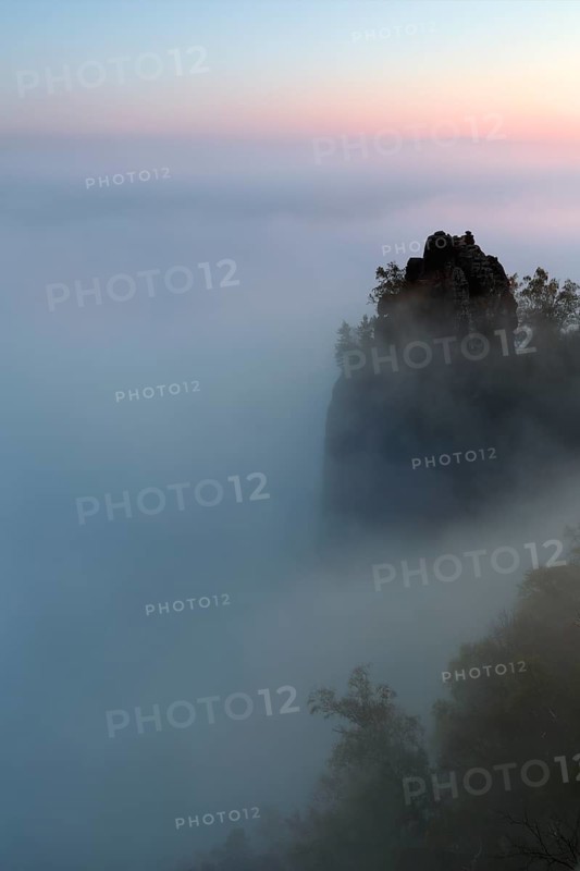 Autumn fog at sunrise