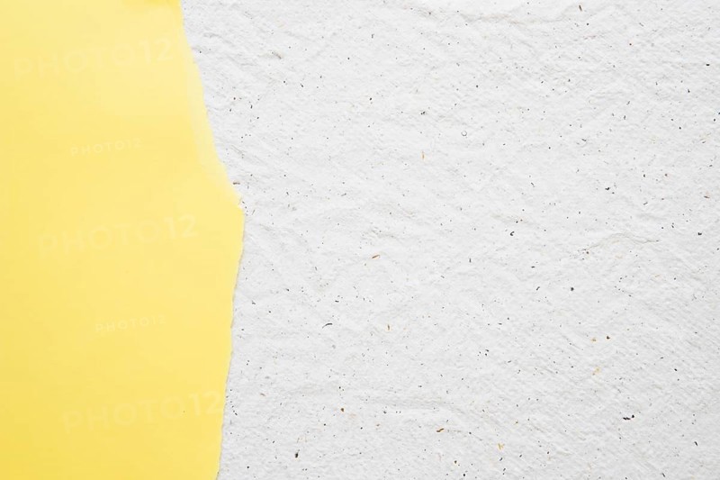 Yellow paper white old textured background