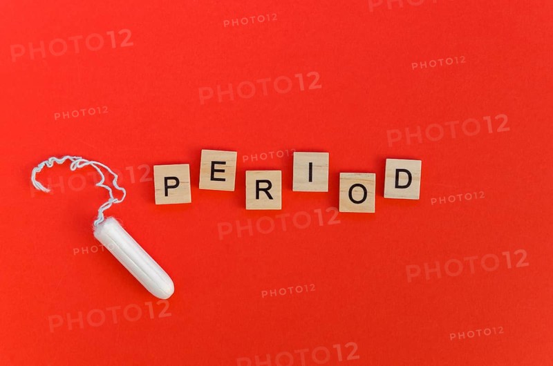 Period word with scrabble letters tampon