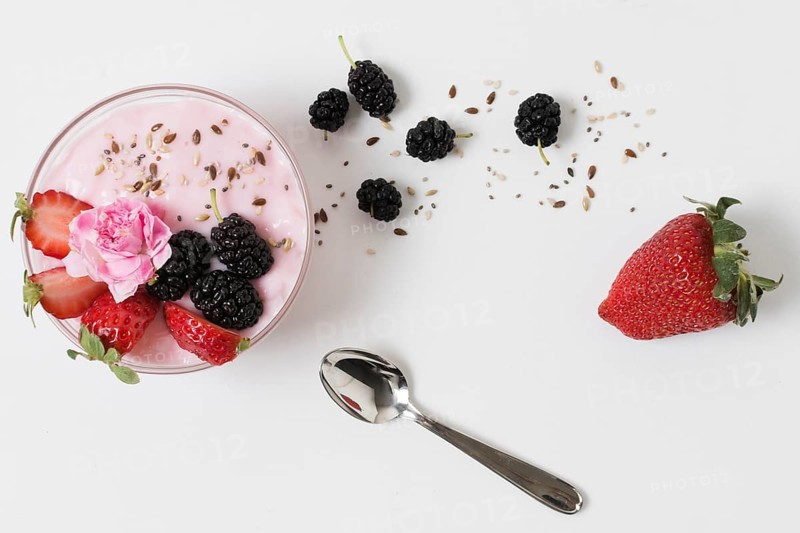 Top view fruit yoghurt with rose