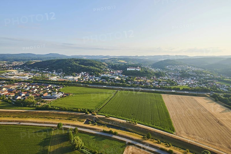 Aerial view over the fields and forests to the castle in Woerth an der Donau