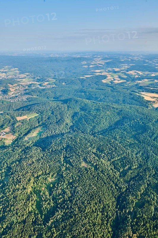 Aerial view over the fields and forests near Woerth an der Donau