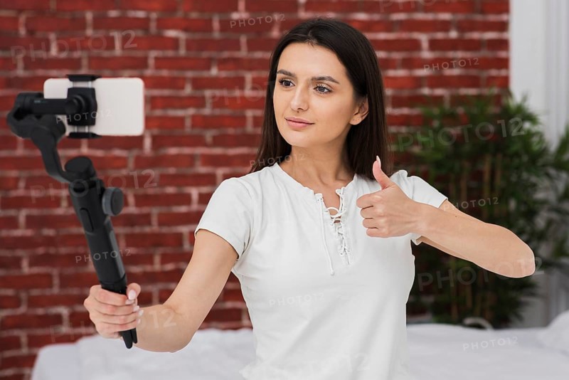 Young female recording live home