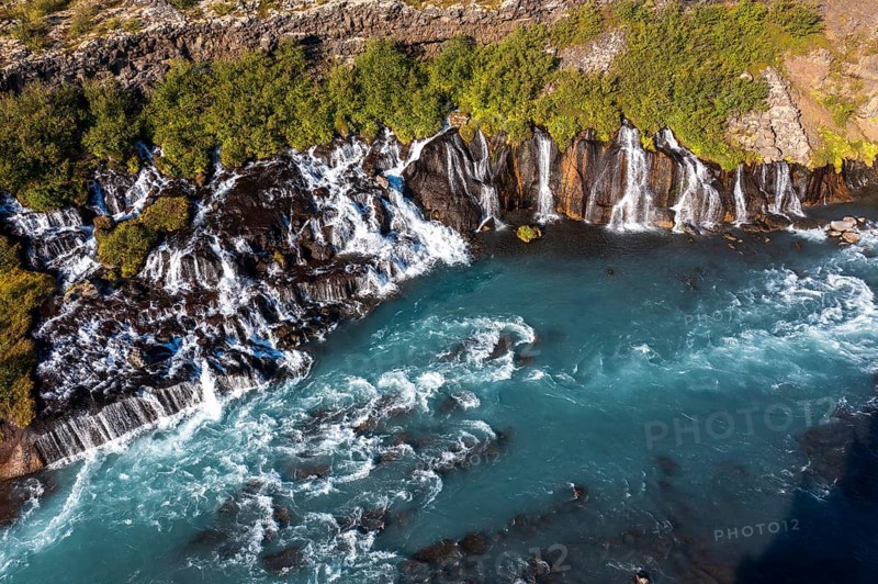 Hraunfossar waterfalls with river Hvita in summer