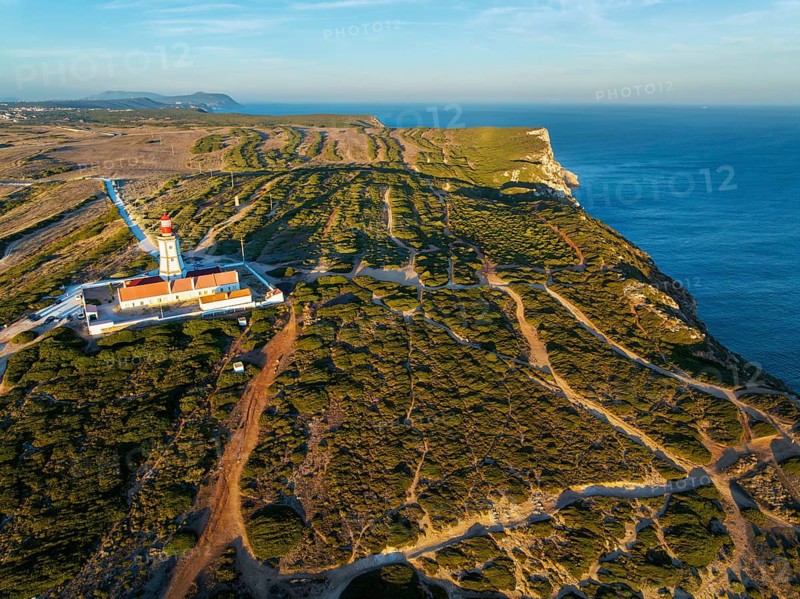Aerial drone view of lighthouse on Cabo Espichel cape Espichel on Atlantic ocean