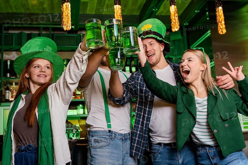 Happy people celebrating st patrick s day