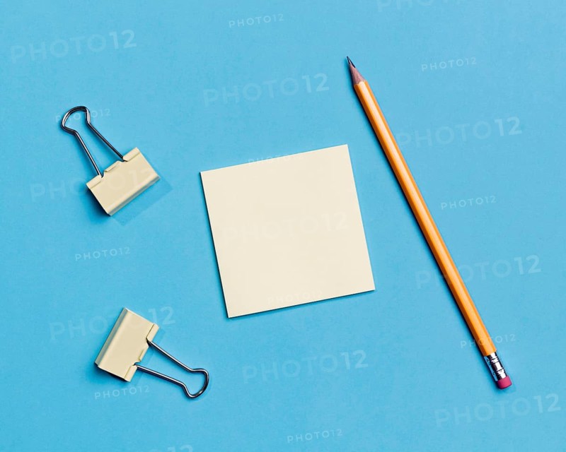 Top view paper clips pencil desk