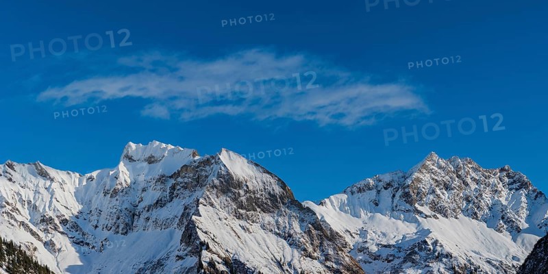 Mountain panorama in winter from Untere Lugenalpe
