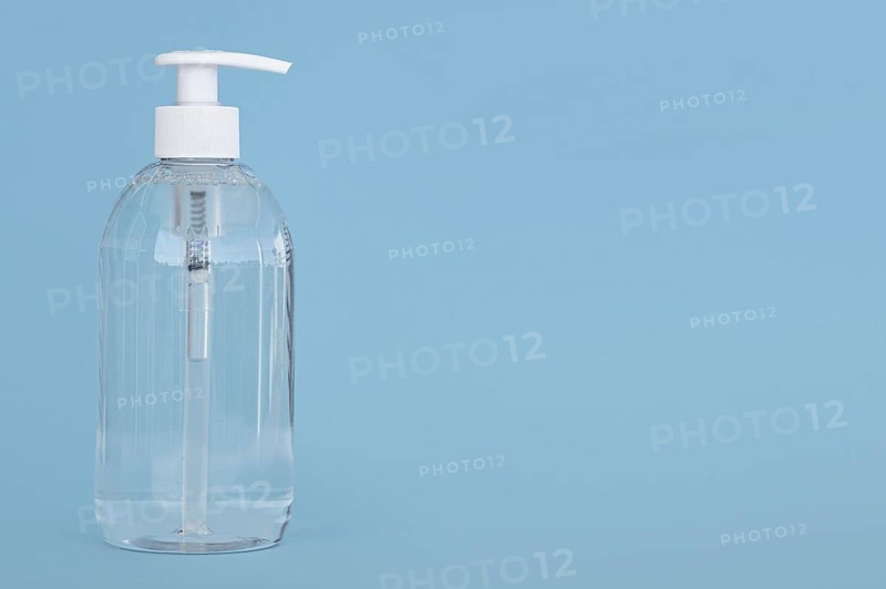 Front view transparent bottle liquid soap with copy space