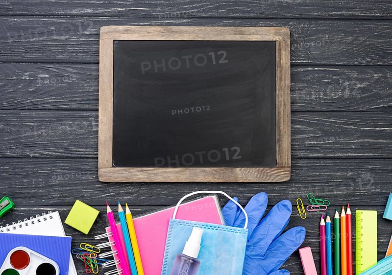 Top view back school stationery with multicolored pencils