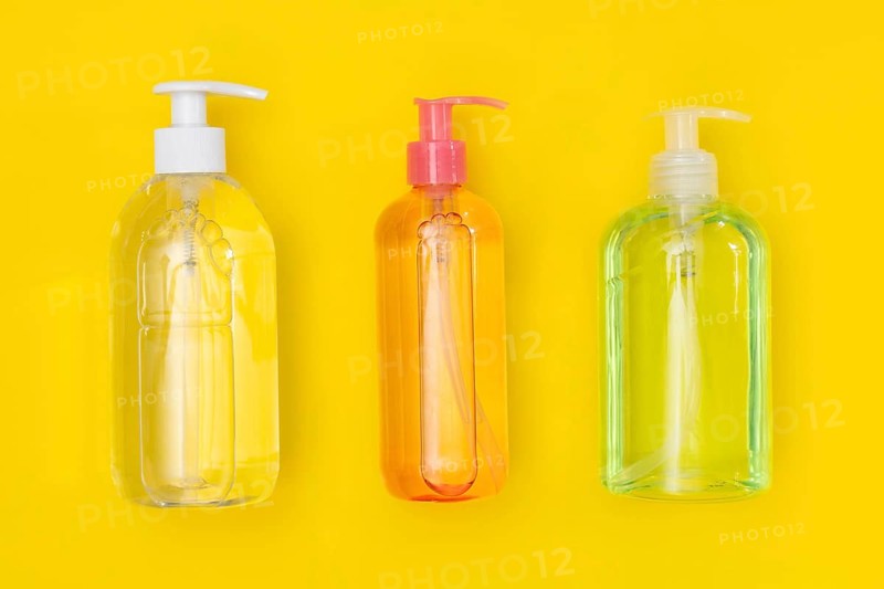 Top view plastic bottles with hand sanitizer liquid soap