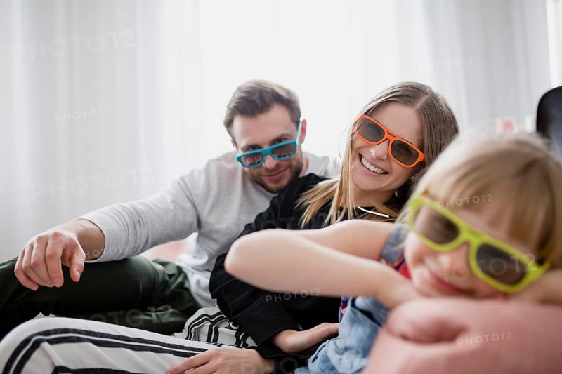 Family 3d glasses looking camera