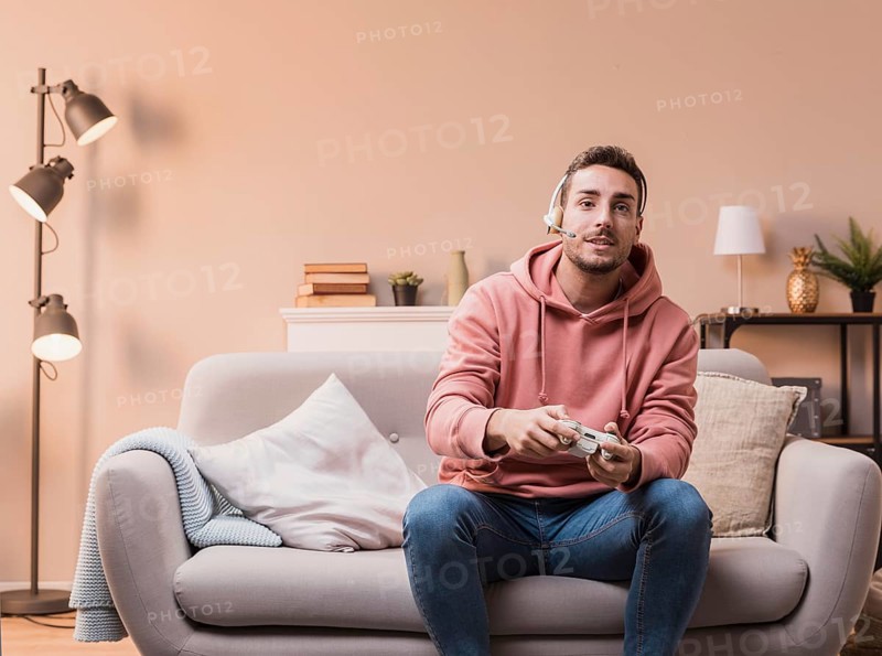 Man with headphones playing