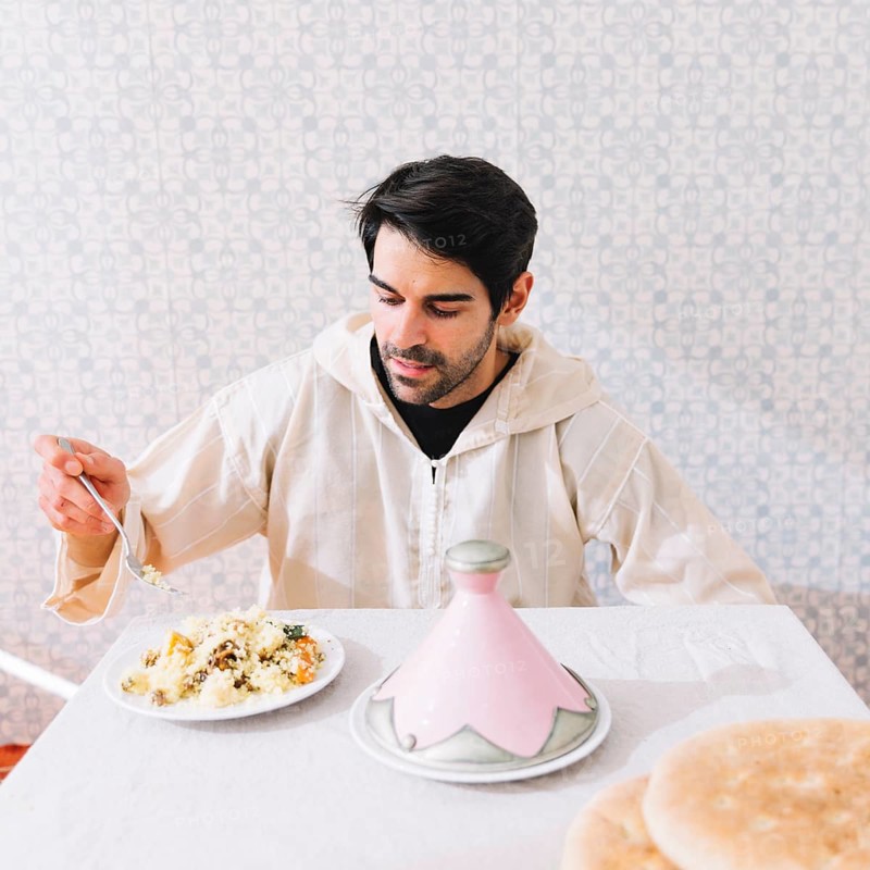 Muslim man eating