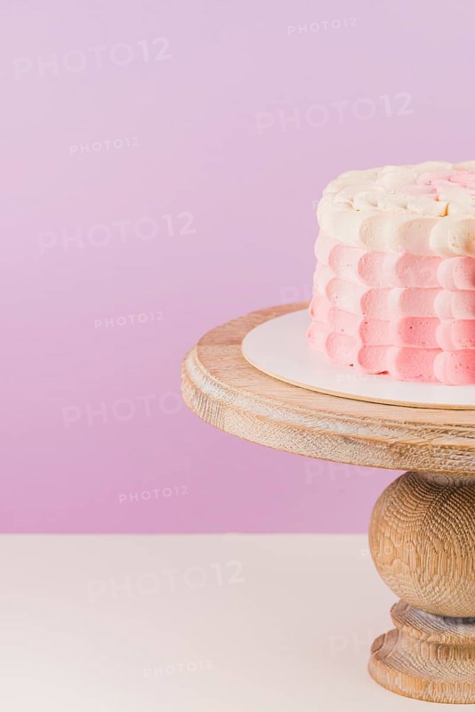 Close up birthday cake wooden cakestand