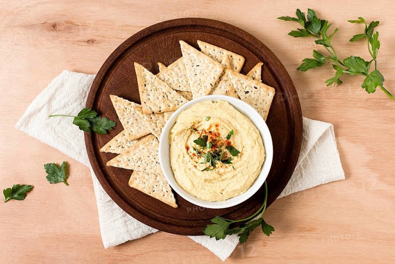 Top view nacho chips with hummus