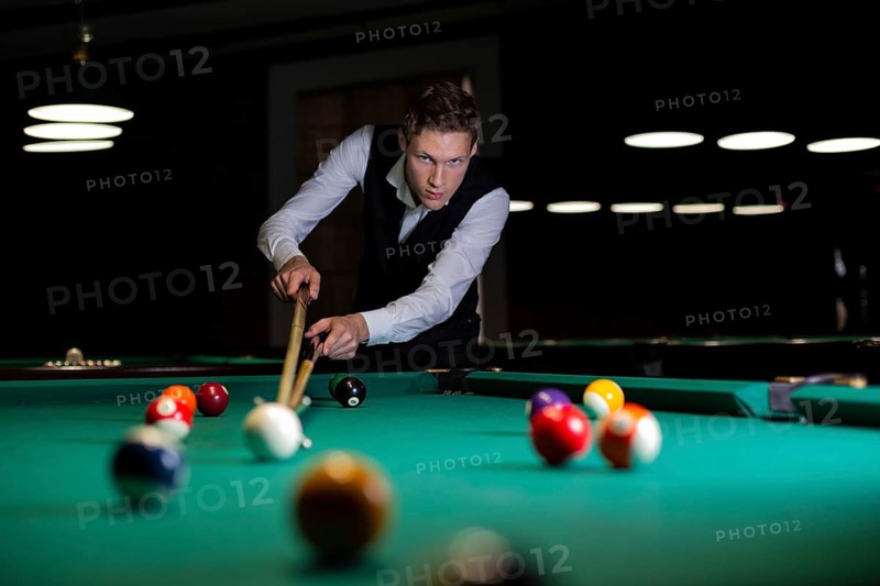 Medium shot guy preparing hit ball