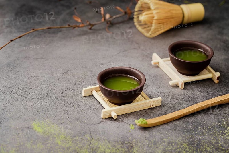 Close up matcha tea cups with copy space