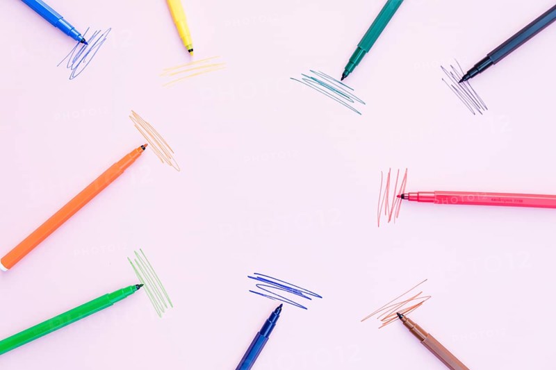 Marker pens lying near strokes