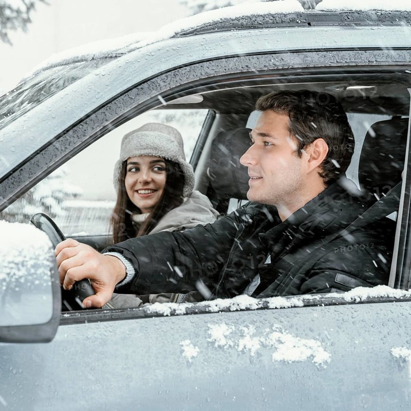 Side view couple together car while road trip