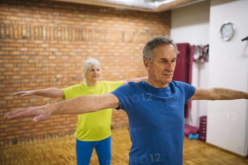 Older couple training gym