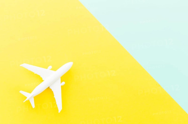 Small toy plane bright table