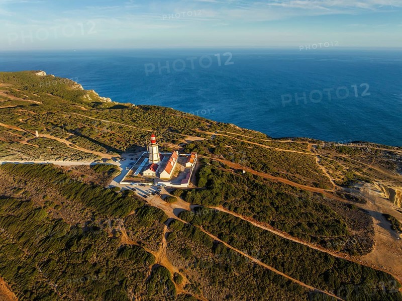 Aerial drone view of lighthouse on Cabo Espichel cape Espichel on Atlantic ocean