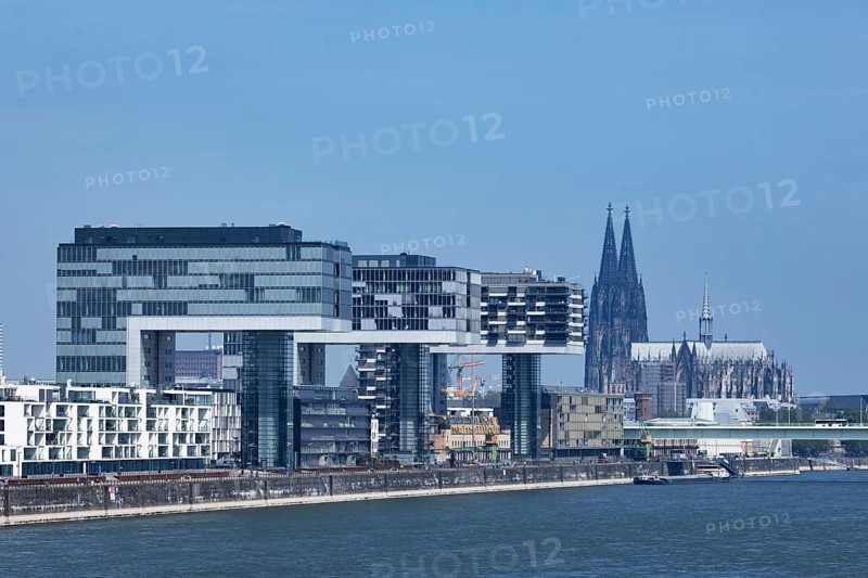 City view of the Rheinauhafen in Cologne with the 3 crane houses