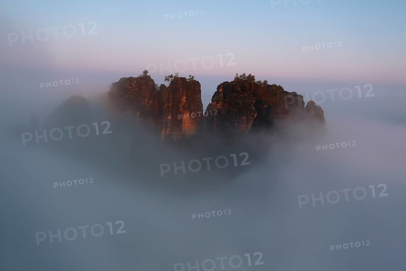 Autumn fog at sunrise