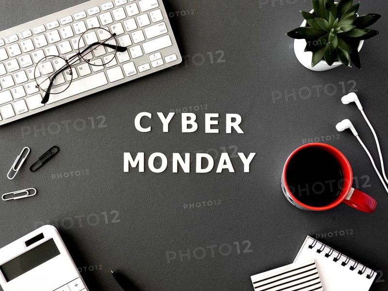 Top view keyboard with coffee glasses cyber monday