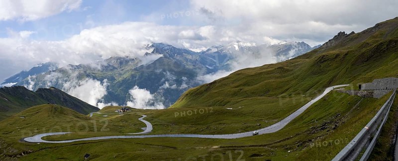 Morning fog drifts over a mountain ridge